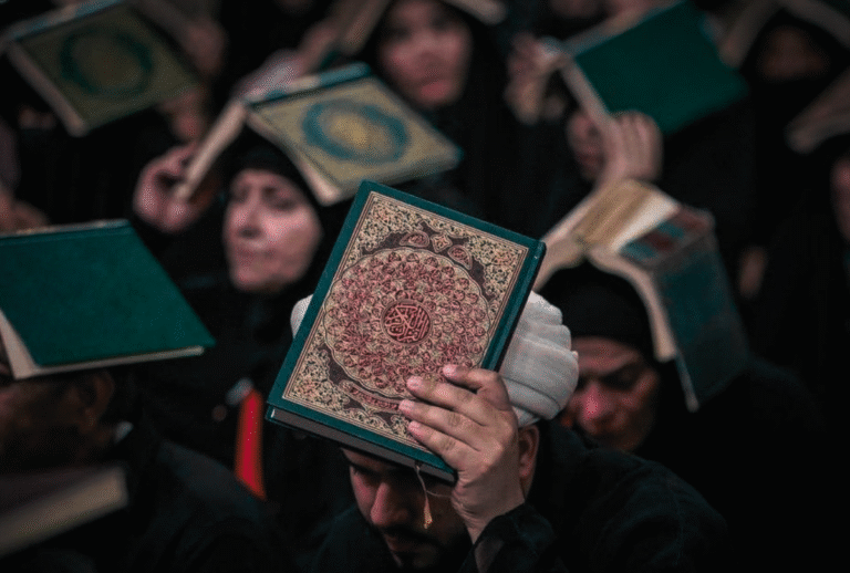 Why do Muslims raise the Quran on their heads on Laylatul Qadr?